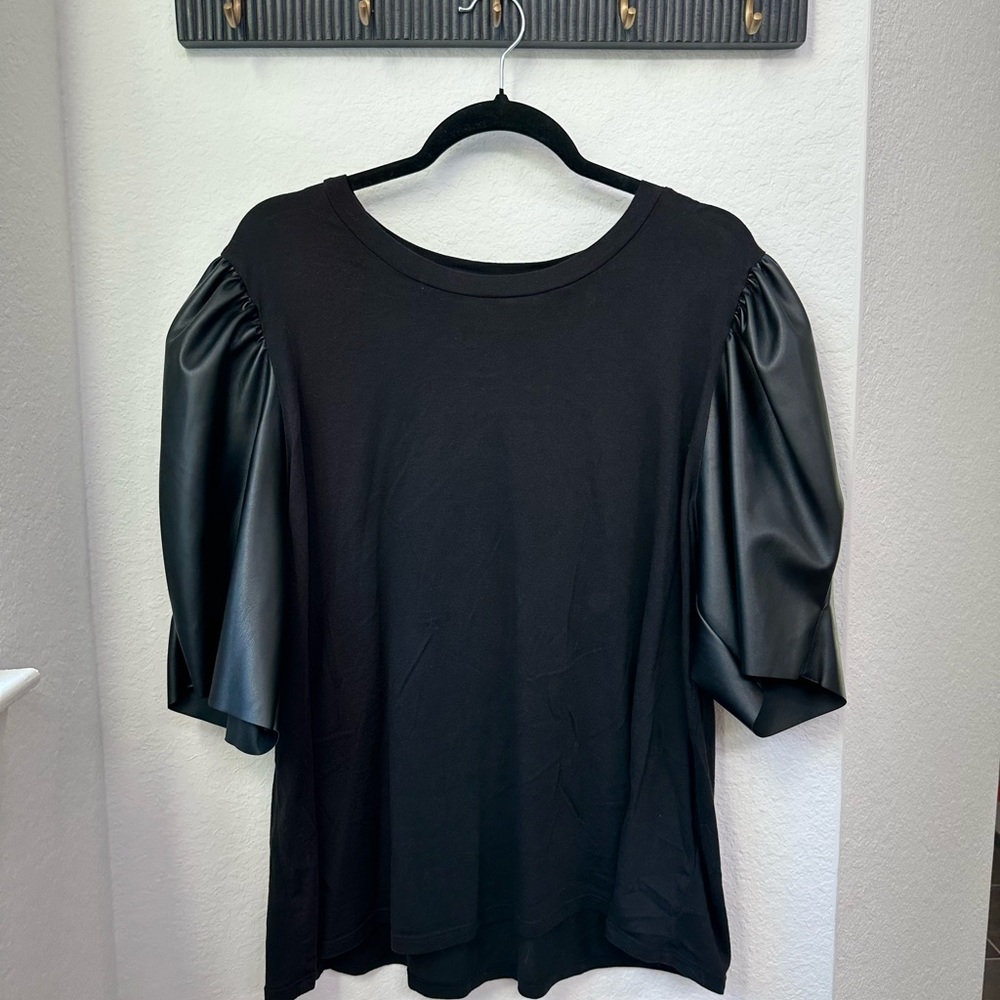 Black, dressy t-shirt with leather sleeves